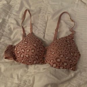 reposing victoria secret pink leopard push up bra, size 32b.